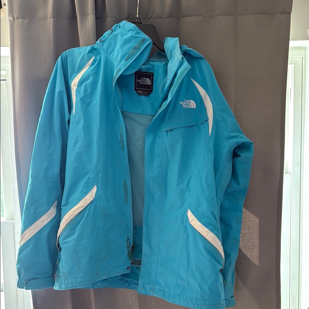 The North Face Turquoise Jacket with White Accents